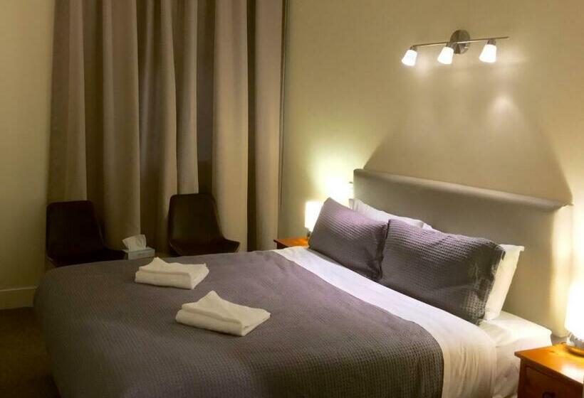 キングサイズベッドのデラックスルーム, Grand Central Serviced Apartments