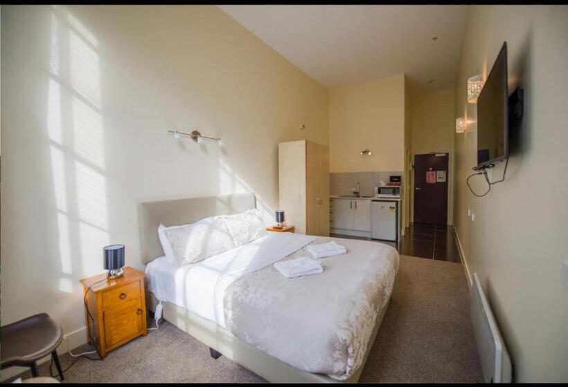 キングサイズベッドのデラックスルーム, Grand Central Serviced Apartments