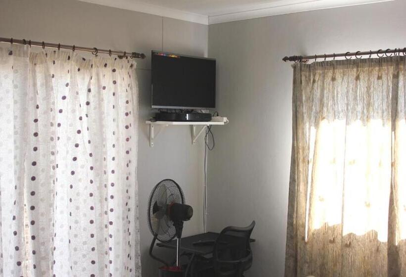 Quarto standart com varanda, Coco Palm Bed & Breakfast