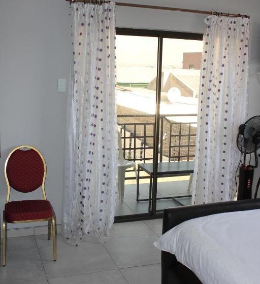 Quarto standart com varanda, Coco Palm Bed & Breakfast