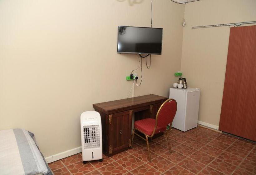 Quarto Economy, Coco Palm Bed & Breakfast