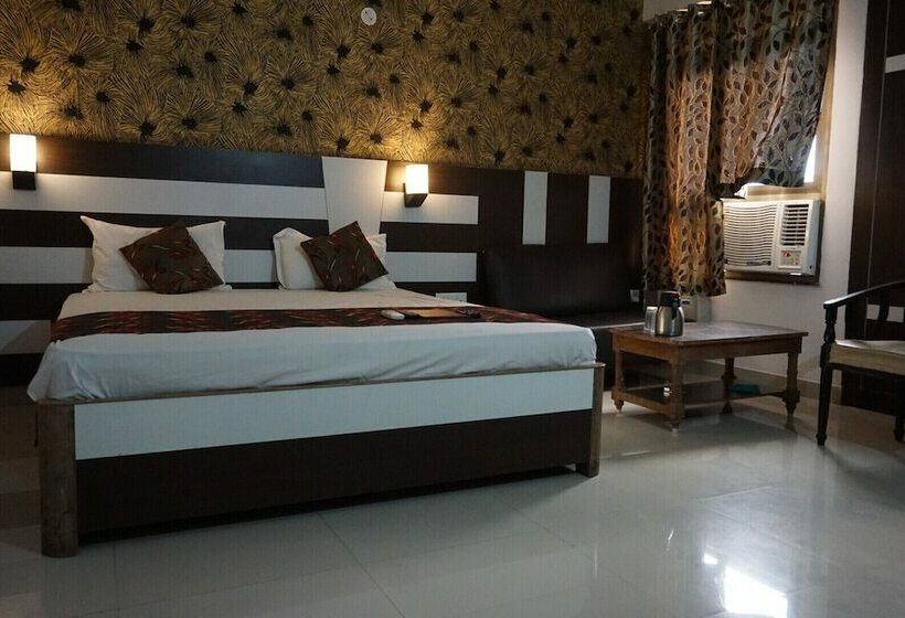 Quarto Deluxe, Mani International