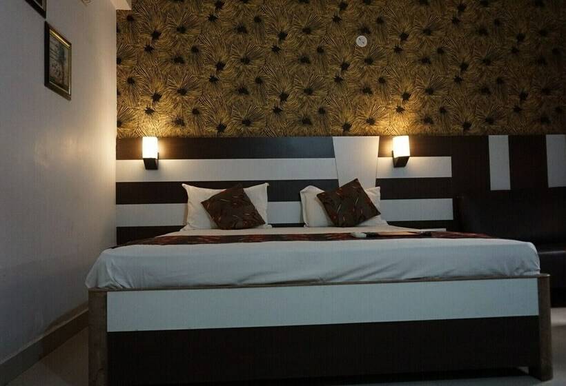 Quarto Deluxe, Mani International