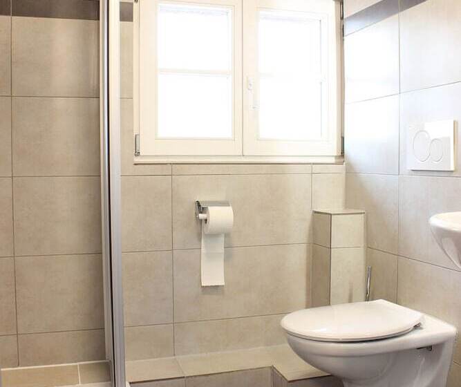 Economy Quadruple Room, Garni City