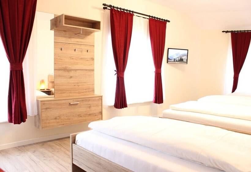 Economy Quadruple Room, Garni City