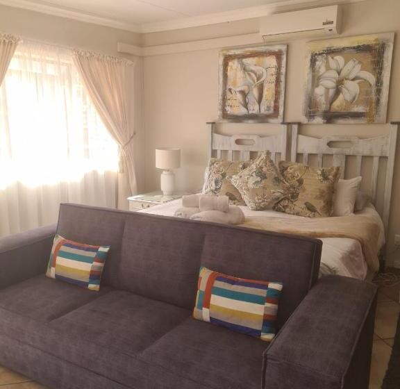 غرفة عائلية, Jakkalsdraai Guest House