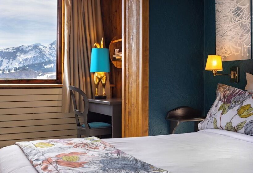 غرفة عائلية, Hôtel Courcheneige