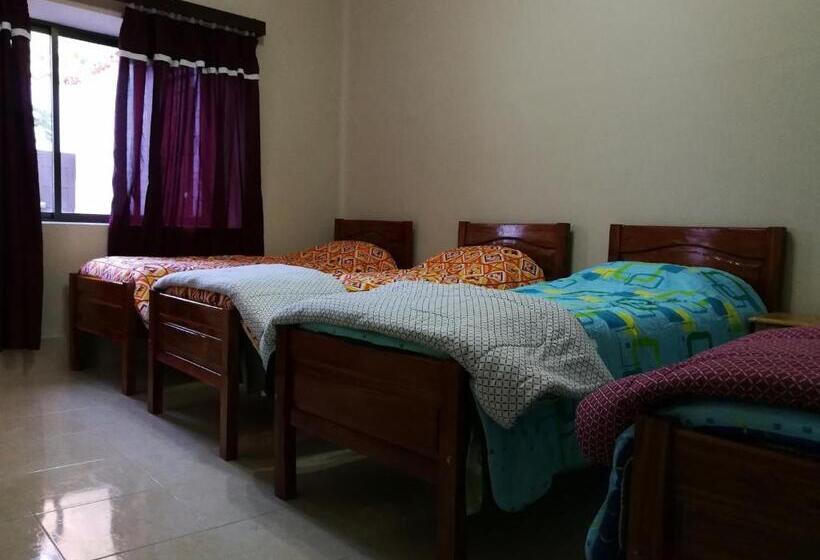 Bed in Shared Room with Shared Bathroom, Tierra Nuestra