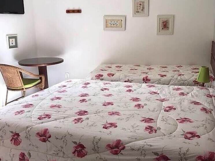 Quarto Quadruple Standart com Varanda, Pousada Alice