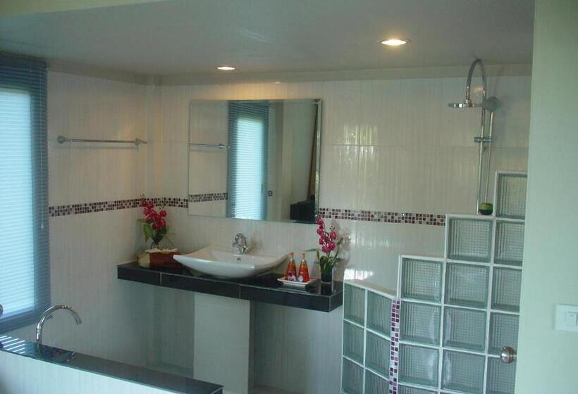 غرفة ديلوكس رباعية, Faye Orchid Garden Resort