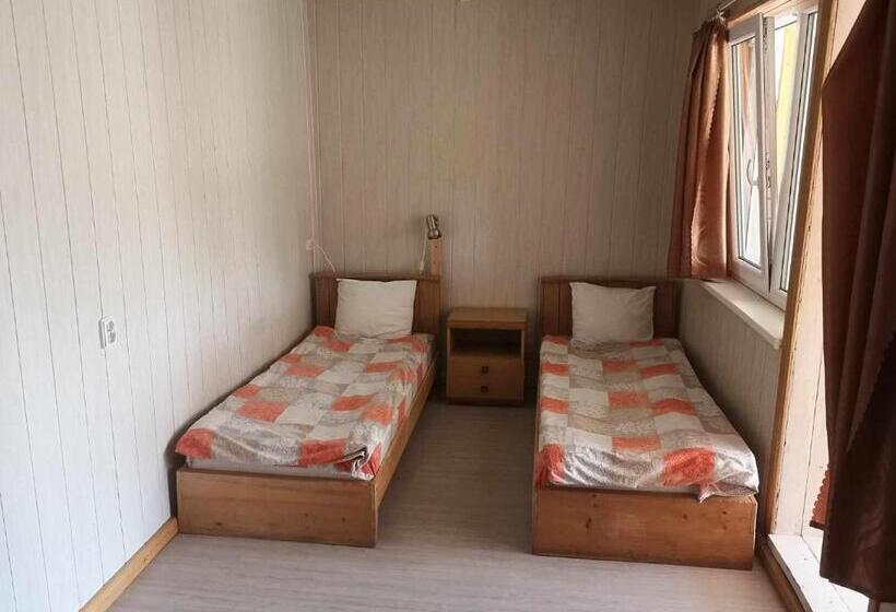 اتاق خانوادگی با چشم‌انداز باغ, Griežto 5