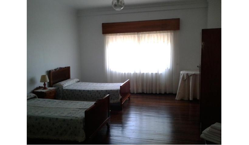 חדר סטנדרט לשלושה עם חדר אמבטיה משוף, Hostal Pumar