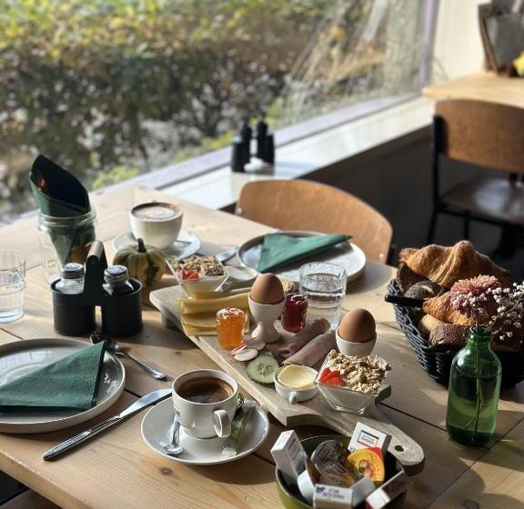 豪华套房, De Watertoren