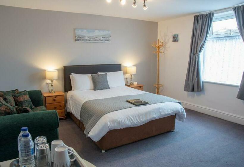 Quarto Estandar Cama King, Q Accommodation