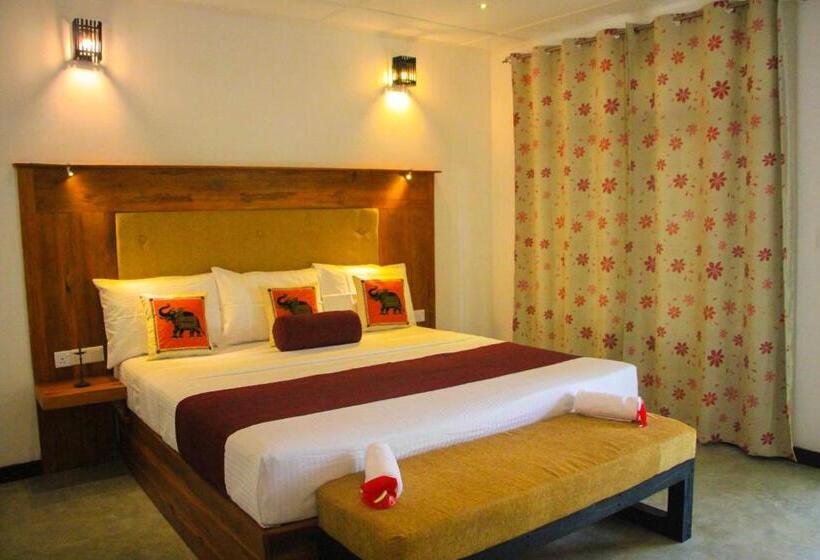 חדר דלוקס לשלושה עף נוף, Palmyra Nature Resort Sigiriya