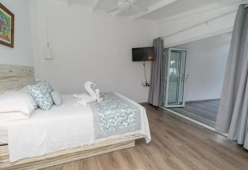 اتاق استاندارد با بالکن و چشمانداز دریا, Romance Bungalows