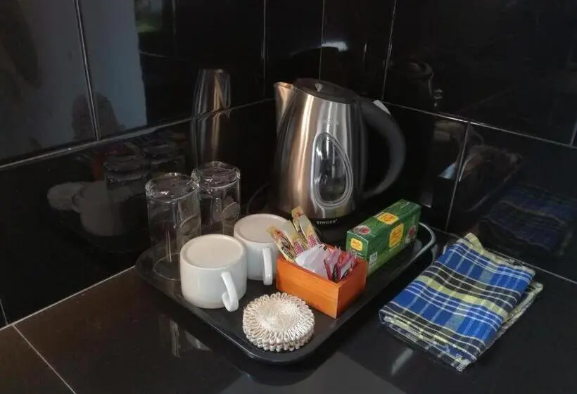 デラックスルーム, Apna Homestay Apartments
