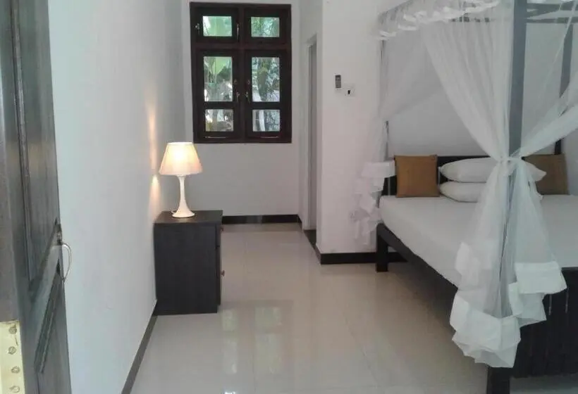デラックスルーム, Apna Homestay Apartments