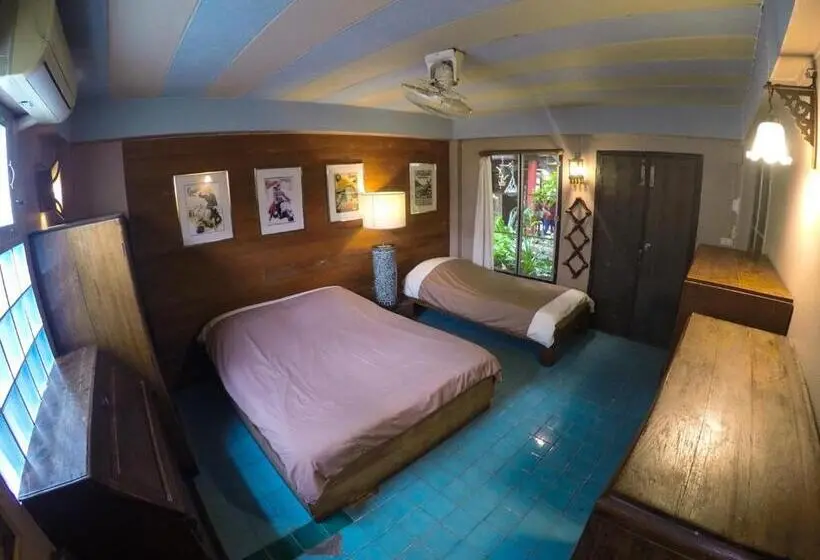 اتاق خانوادگی با چشم‌انداز باغ, The Riverside Guest House