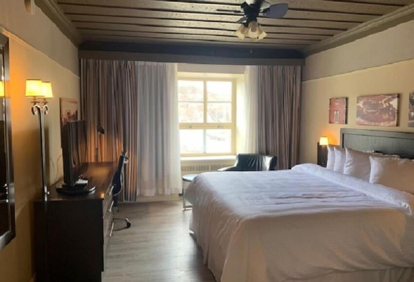 חדר אקזקיוטיב, Hôtel Le Manoir