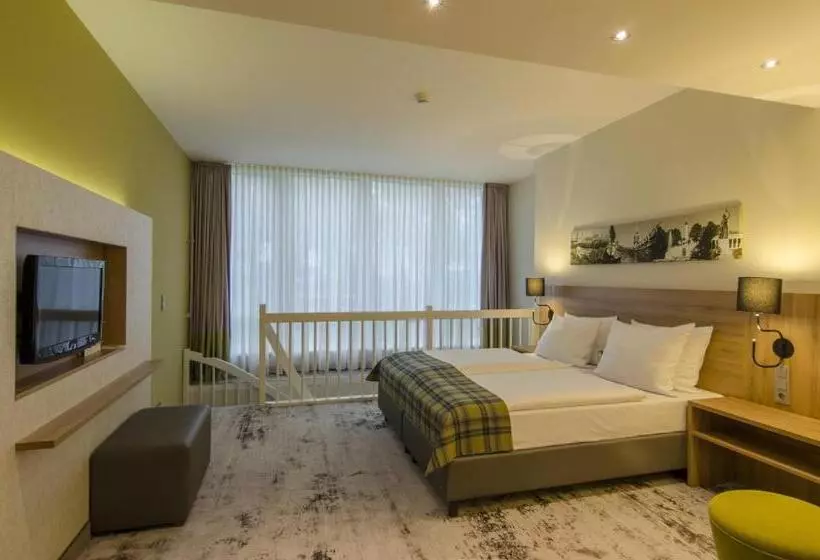 キングサイズベッドのスタンダードルーム, Holiday Inn Munich Unterhaching, An Ihg