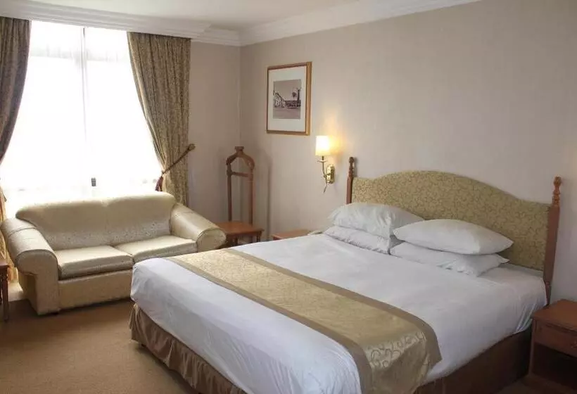 キングサイズベッドのデラックスルーム, Merdeka Palace Hotels & Suites
