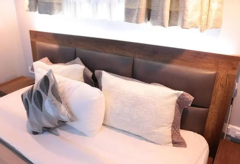 キングサイズベッドのデラックススイート, Lady M Guest House