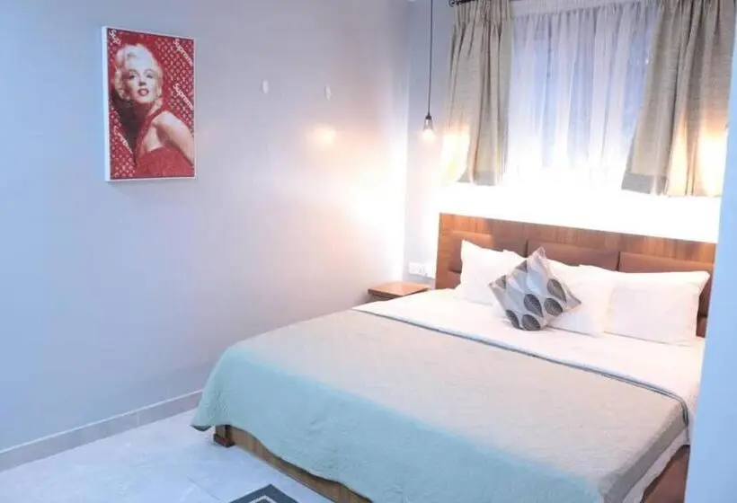 キングサイズベッドのデラックススイート, Lady M Guest House