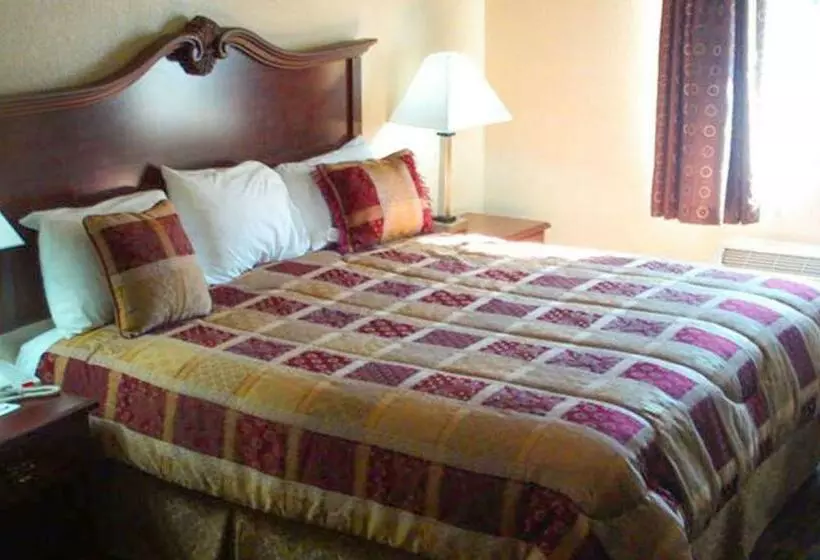 キングサイズベッドのスタンダードルーム, Western Motel Inn And Suites Hazelhurst