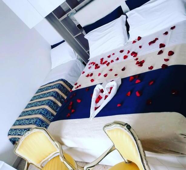 スタンダードトリプルルーム, Dea Della Salute