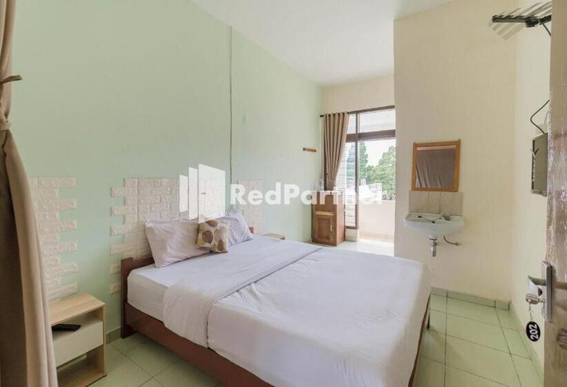 Номер Deluxe, Pondok Cahaya Panorama Mitra Reddoorz