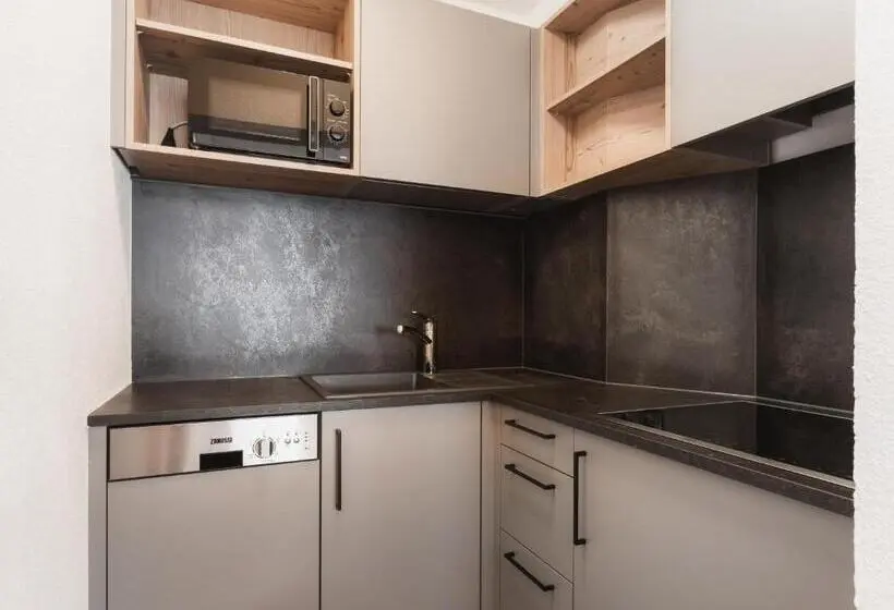 庭の見える１ベッドルームアパートメント, Alpina&more Apartments I Zimmer