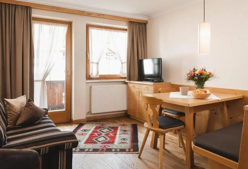 庭の見える１ベッドルームアパートメント, Alpina&more Apartments I Zimmer