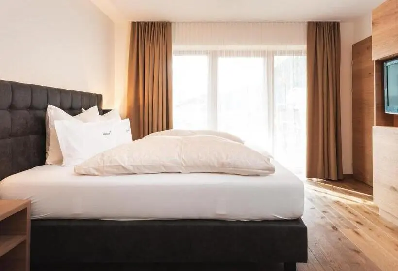テラス付き１ベッドルームアパートメント, Alpina&more Apartments I Zimmer