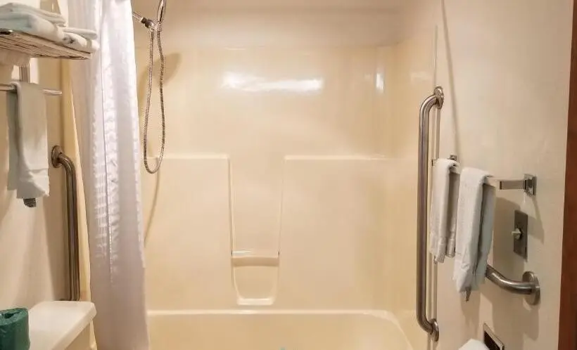 キングサイズベッドのデラックスルーム, The Parkwood Inn & Suites