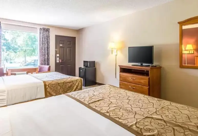 キングサイズベッドのデラックスルーム, The Parkwood Inn & Suites