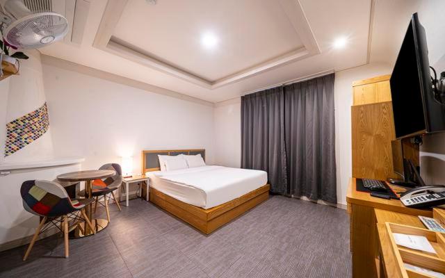 חדר דלוקס, Masan Amor