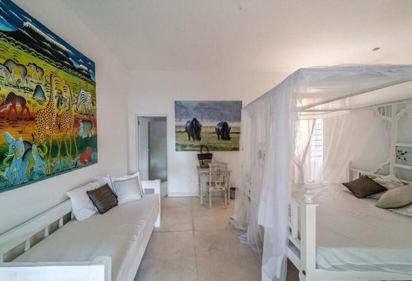 اتاق استاندارد سه تخته با چشمانداز باغ, Nyumba Ya Mbuyu