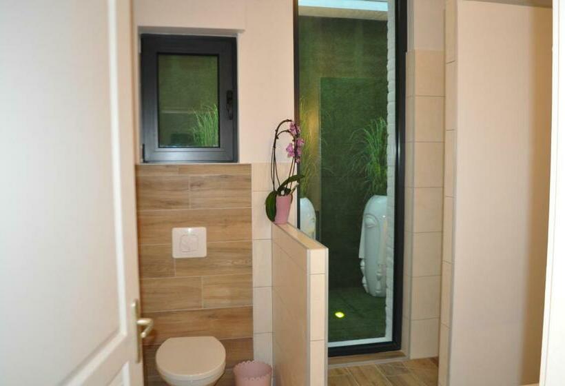 استودیو استاندارد با چشم‌انداز باغ, Au Cœur Du Jardin