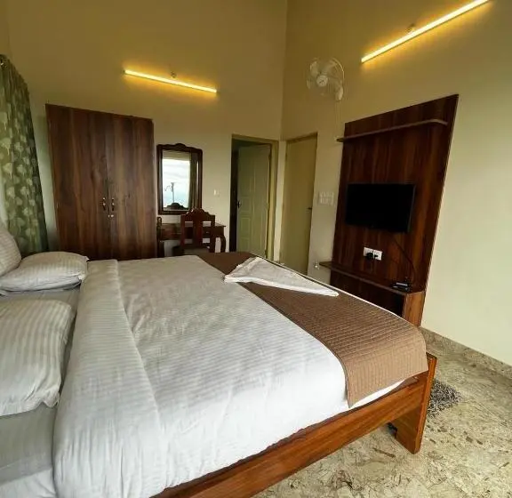 キングサイズベッドのデラックスルーム, Kstdc Hotel Mayura Pine Top Nandi Hills