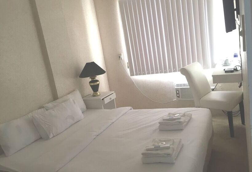 غرفة إقتصادية سرير مزدوج, Reddoorz Premium At The Grand Peninsula Suites