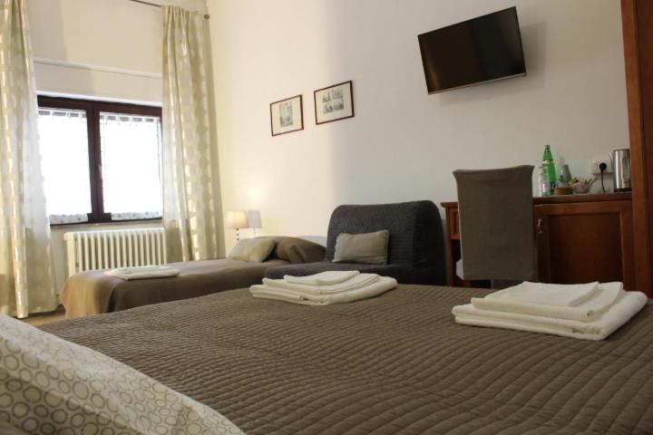 اتاق استاندارد چهار تخته, Sentimento Del Tempo B&b