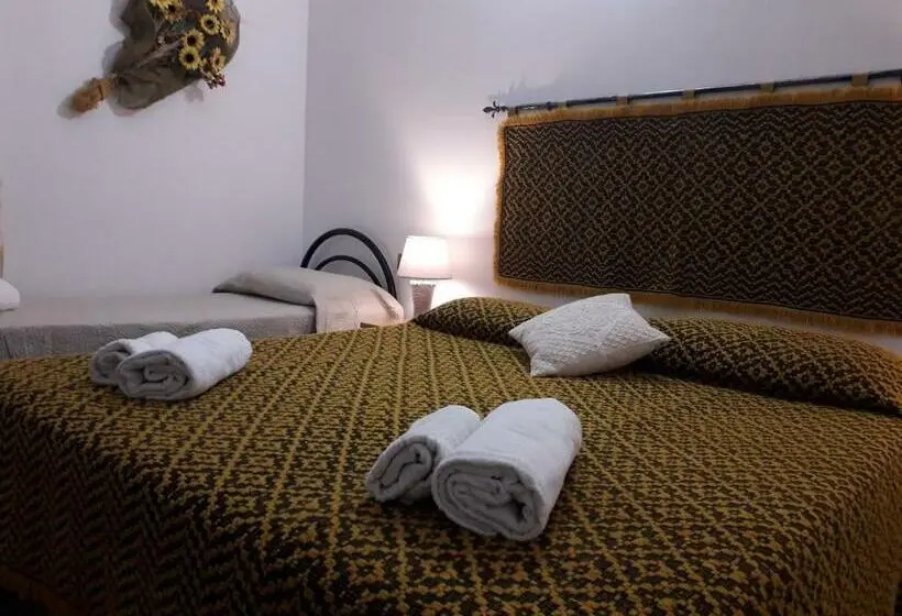 庭の見えるスタンダードトリプルルーム, Agriturismo Quattro Mori