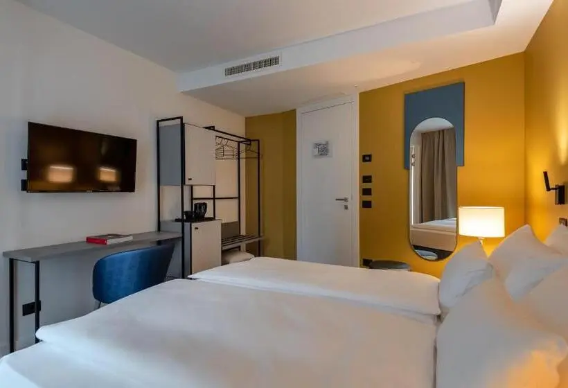 Quarto standart vista jardim, Ht Hotel Trieste