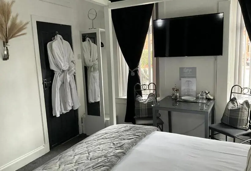 キングサイズベッドのデラックスルーム, Peacock Guest House