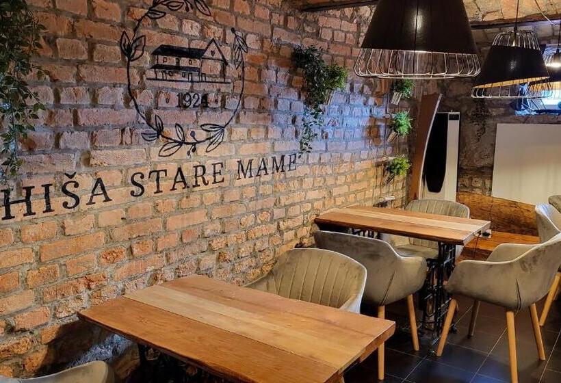 اتاق اکونومی, Hiša Stare Mame