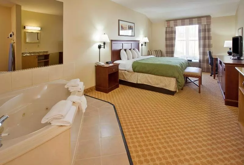 キングサイズベッドのスイートルーム, Country Inn & Suites By Radisson, Birch Run Frankenmuth, Mi