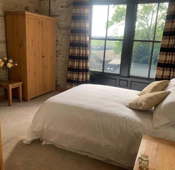 חדר דלוקס, The Weavers Shed