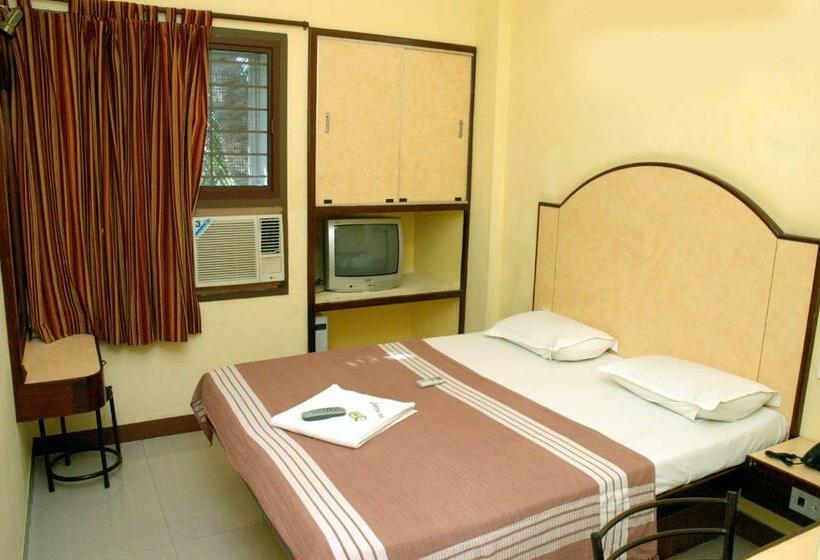 Quarto Deluxe, Aditya Inn