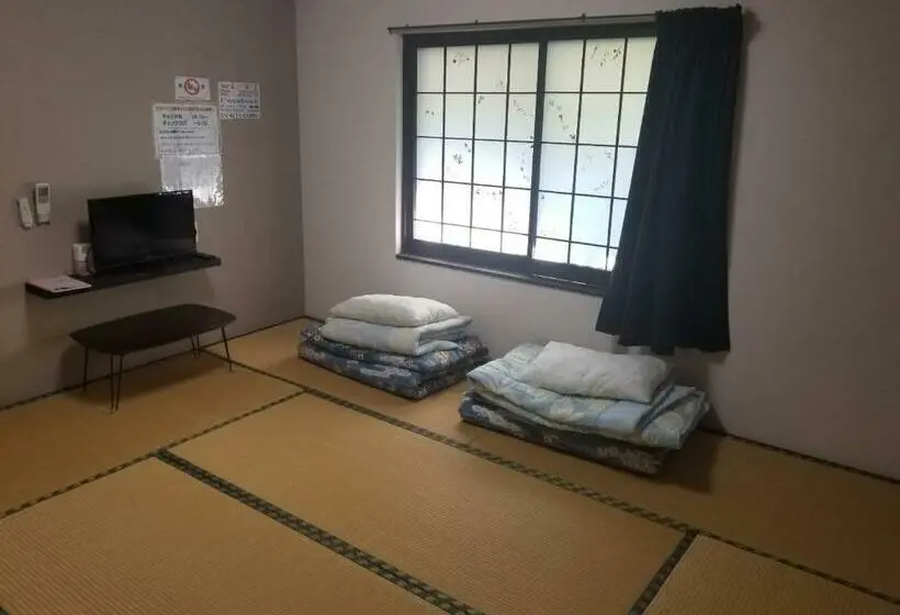 バスルーム共有のトリプルスタンダード, Guest House Shizuho